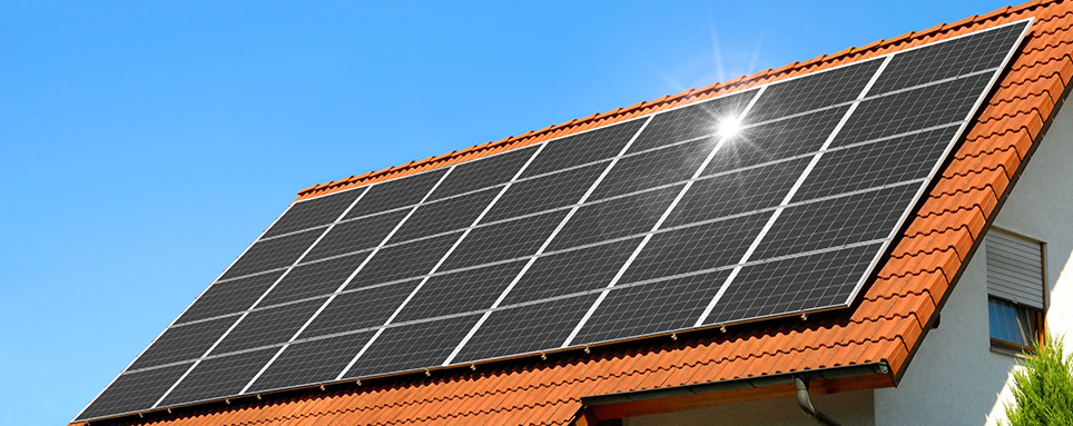 AmeriSun solar panels on concrete tile rooftop.